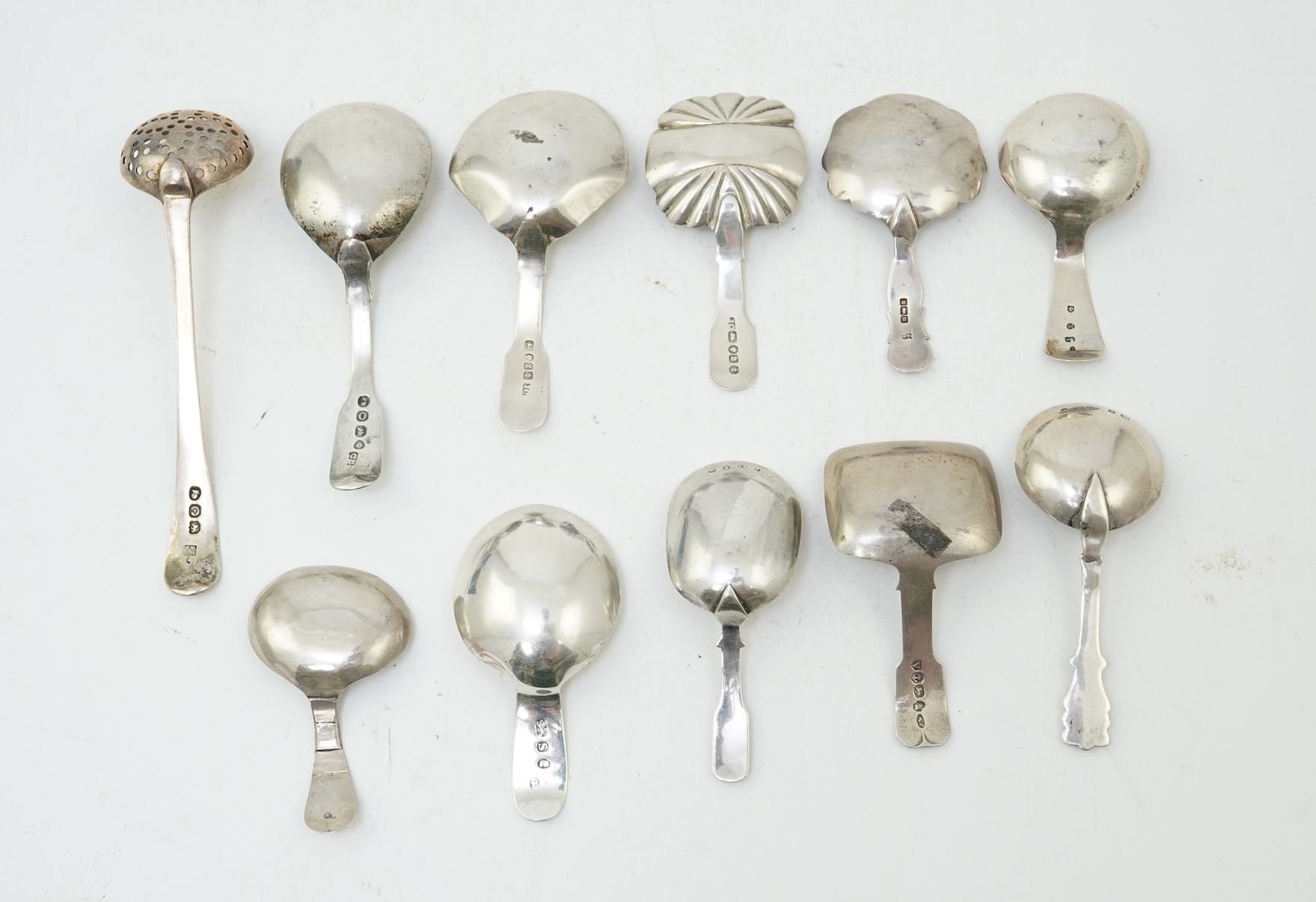 Ten assorted manly 19th century silver caddy spoons